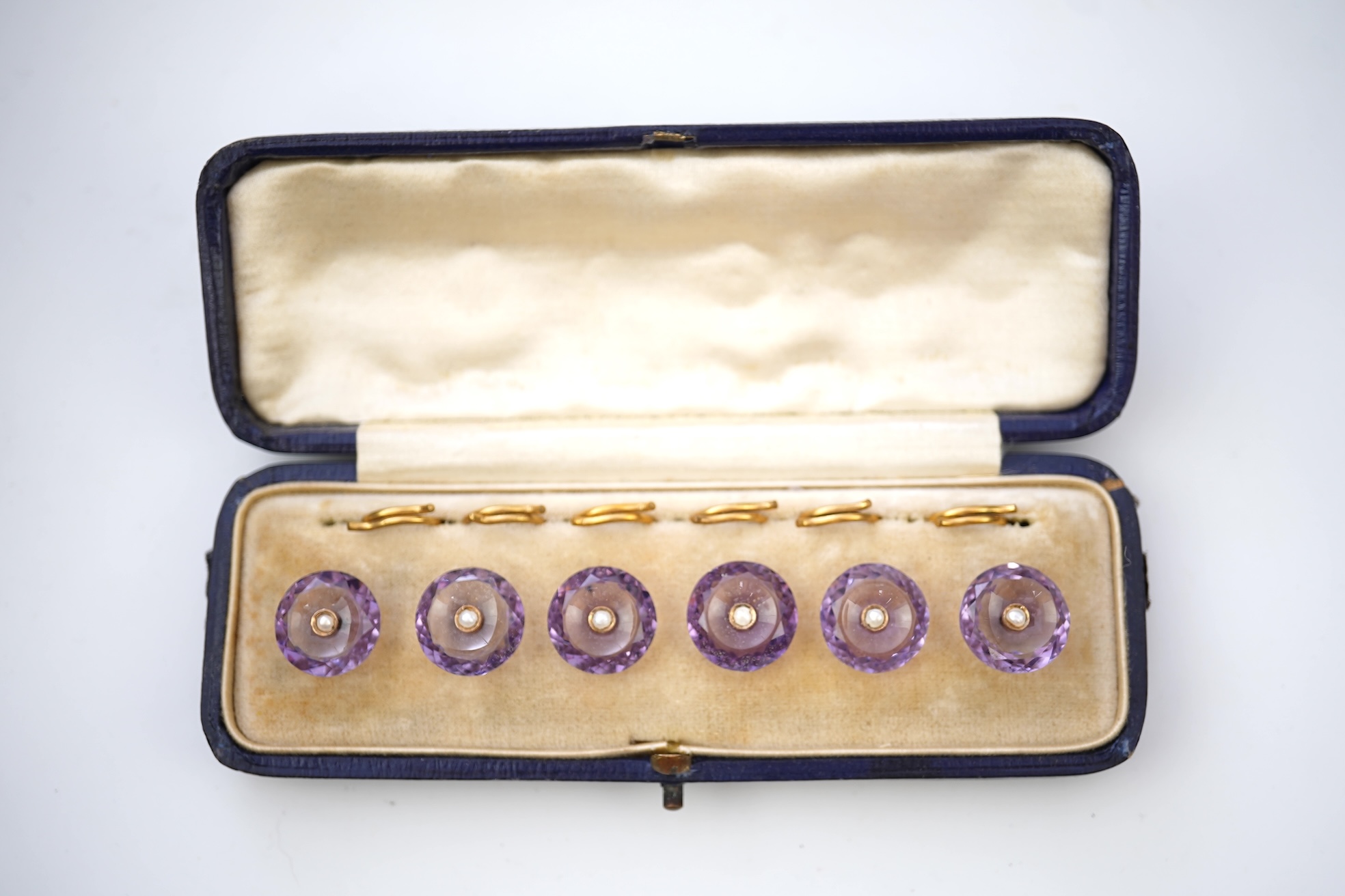 A rare set of amethyst and seed pearl buttons, circa 1900